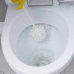 cleaning toilet