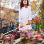 Leaf raking girl