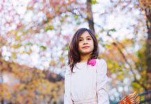 Leaf raking girl