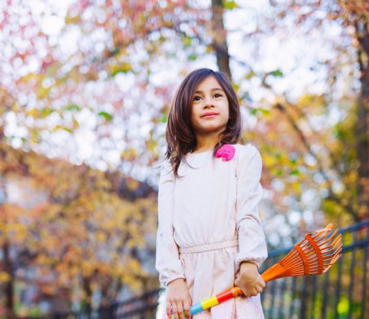 Leaf raking girl